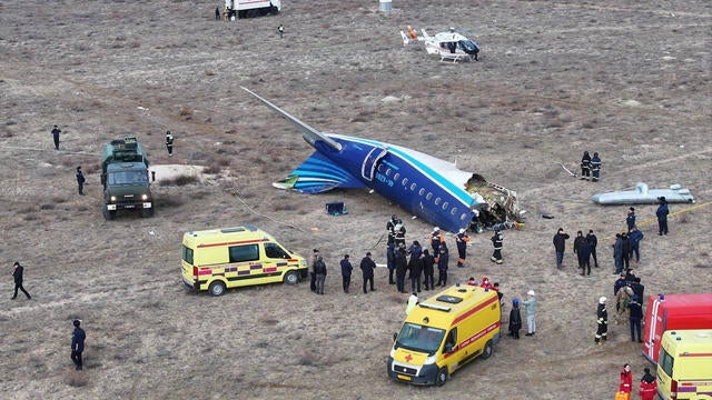 A drone view shows the crash site of a passenger plane near Aktau 