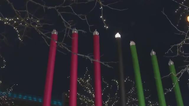 Detroiters celebrate first day of Kwanzaa with annual Kinara lighting 