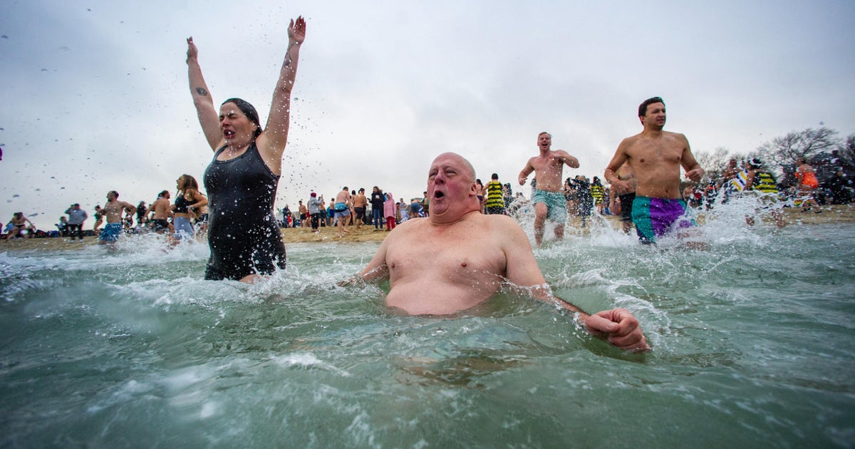 Hundreds plunge into bitter cold water to kick off the new year in South Boston