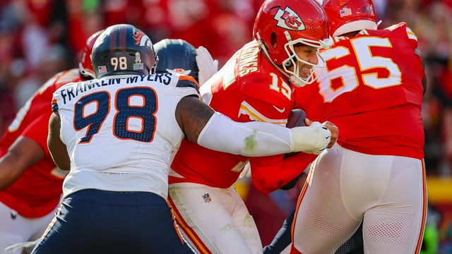 kansas-highway-patrol-car-wedged-between-two-trucks 