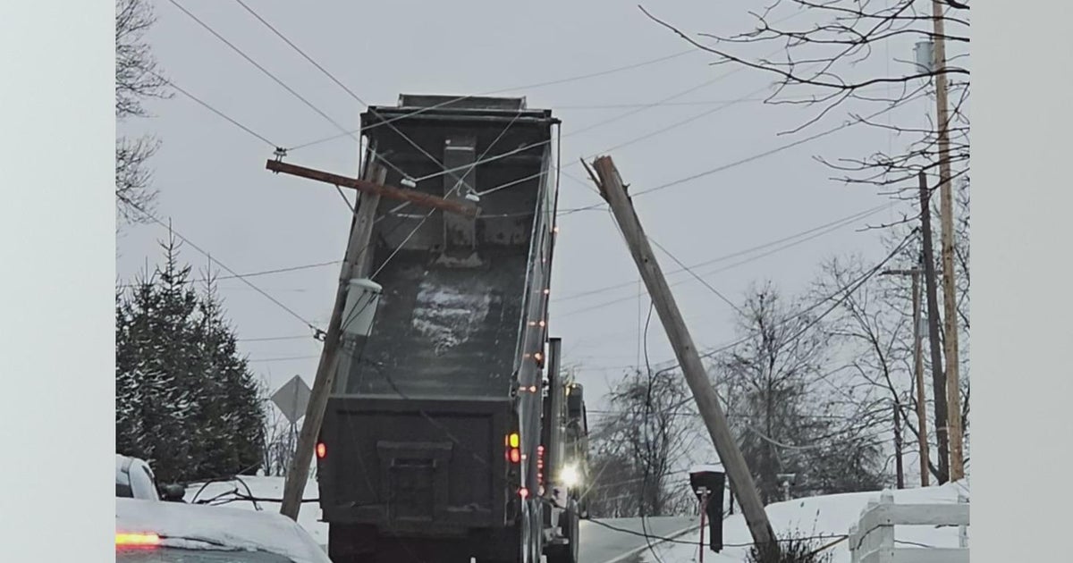 Dump truck bed gets tangled in wires on North Huntingdon road - CBS ...