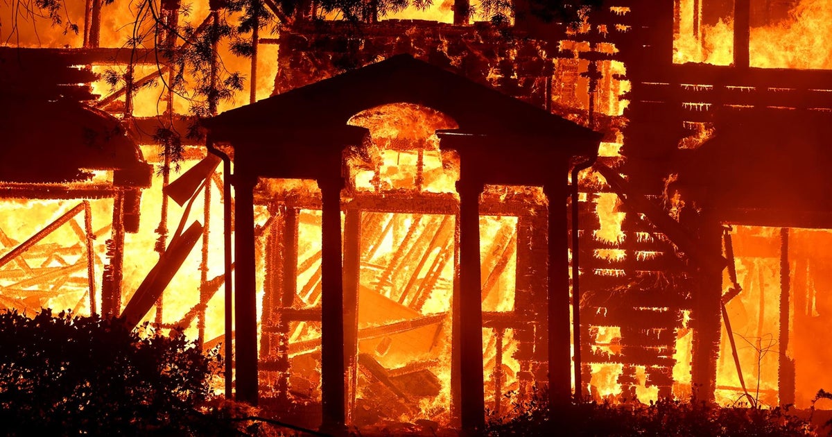 Thousands ordered to evacuate as wildfires burn around Los Angeles
