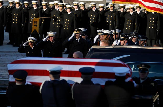 Funeral Procession Brings Body Of Former President Jimmy Carter To U.S. Capitol Building 