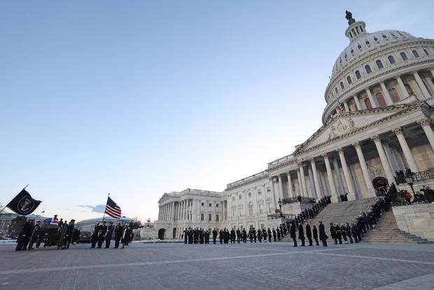 Funeral Procession Brings Body Of Former President Jimmy Carter To U.S. Capitol Building 