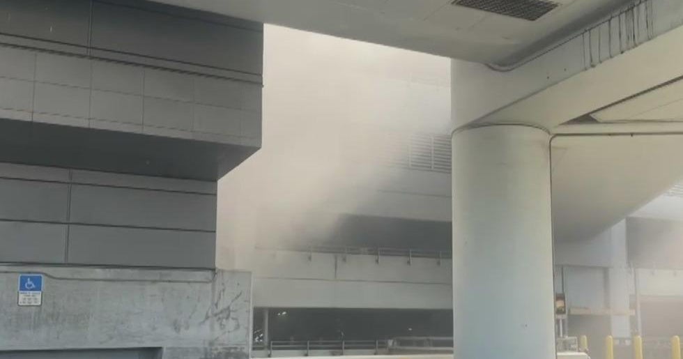 Car erupts in flames at Miami International Airport parking garage fire Car erupts in flames at Miami International Airport parking garage fire