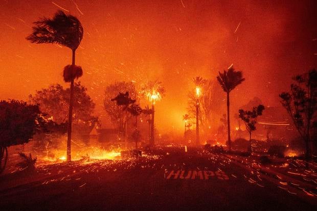 The Palisades Fire ravages a neighborhood in the Pacific Palisades neighborhood of Los Angeles, Jan. 7, 2025. 