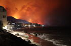 Firefighters continue battling Palisades fire in Los Angeles as flames rage out of control 