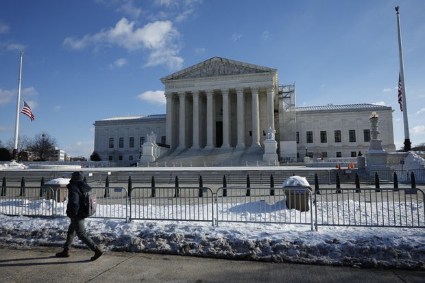 A man walks past the Supreme Court in Washington, D.C., on Jan. 8, 2025.