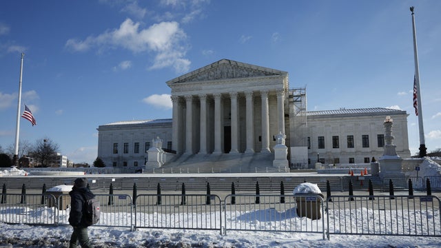 A man walks past the Supreme Court in Washington, D.C., on Jan. 8, 2025.