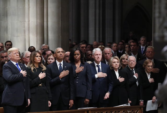 President Donald Trump, First Lady Melania Trump, former President Barack Obama, former First Lady Michelle Obama, former President Bill Clinton, Hillary Clinton, former secretary of state, former President Jimmy Carter, and former First Lady Rosalynn Carter stand during a state funeral service for former President George H.W. Bush at the National Cathedral in Washington, DC, US, on Wednesday, Dec. 5, 2018.
