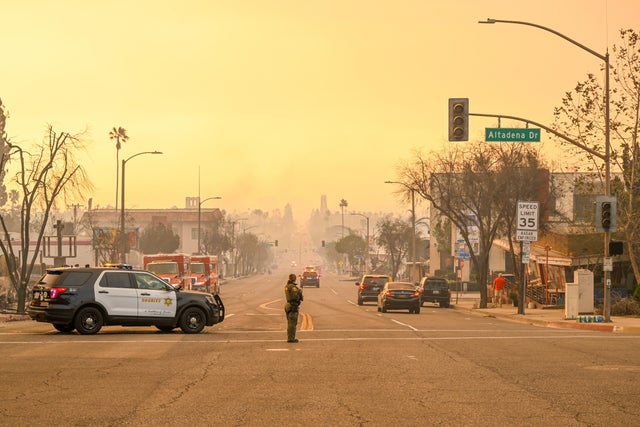Law enforcement takes security measures during the Eaton Fire in the Altadena community of Los Angeles County, California, Jan. 9, 2025. 