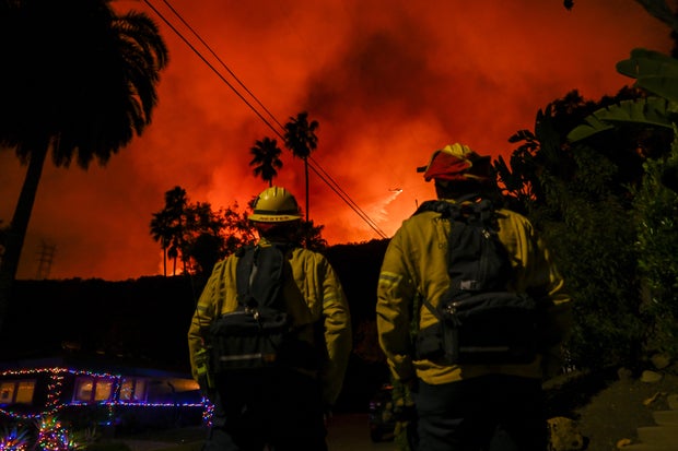 Aerial firefighting efforts intensify over the Palisades wildfire in Los Angeles
