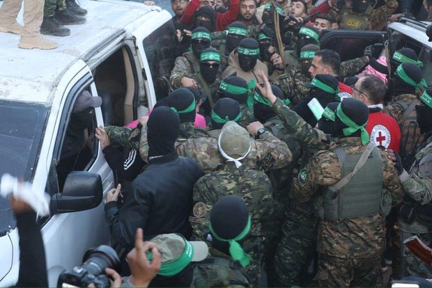 Al-Qassam Brigades hands over 3 Israeli captives to Red Cross