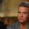 Robbie Williams on how his upcoming biopic "Better Man" uses CGI