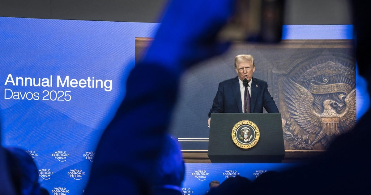 Trump's threat of tariffs reaches global leaders in Davos - CBS News