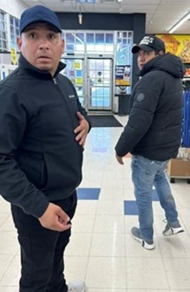Photo of two men in a retail store 