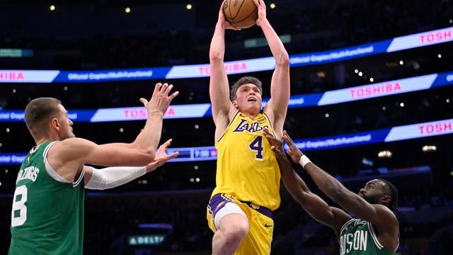 Los Angeles Lakers defeated the Boston Celtics 117-96 to win a NBA basketball game. 