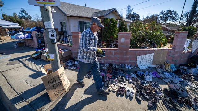 Eaton fire victims return to their burned out homes in Altadena 