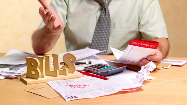 Small businessman dealing with tax return 