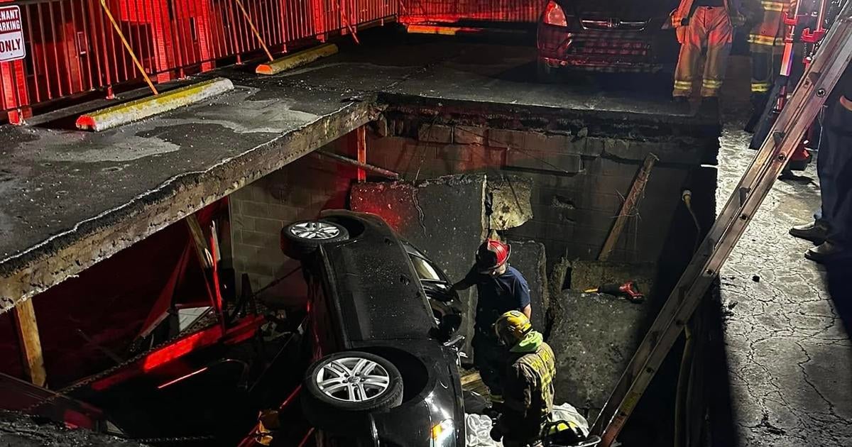 One Rescued After Vehicle Falls Through Bellevue Parking Deck