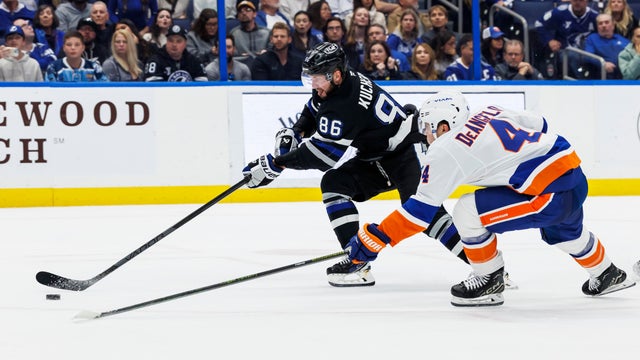 Nikita Kucherov #86 of the Tampa Bay Lightning skates against Tony DeAngelo #4 of the New York Islanders at Amalie Arena on February 1, 2025 in Tampa, Florida. 