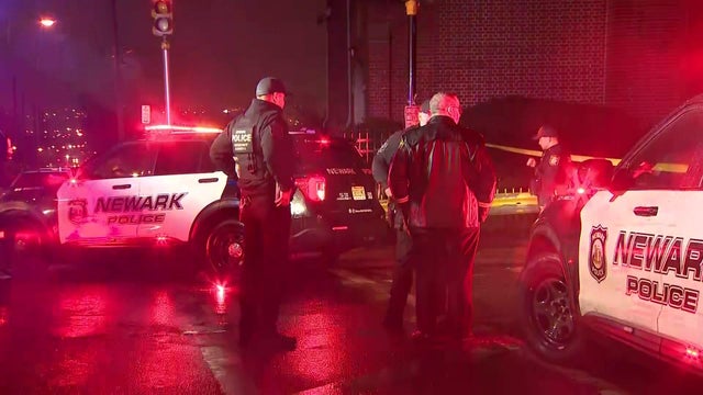Multiple Newark Police vehicles and officers. 