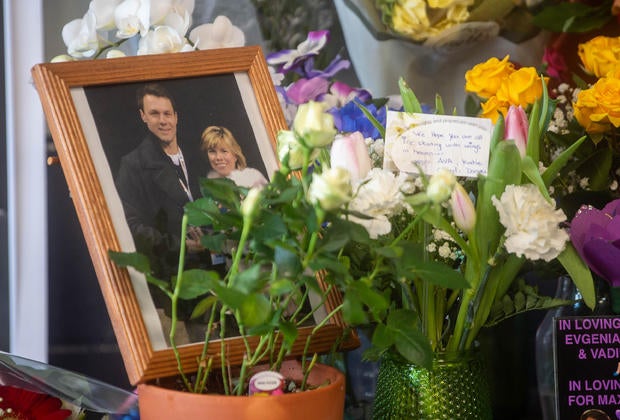 Flowers, photos and messages are seen at a memorial at the International Skating Center of Connecticut before a moment of silence in memory of the D.C. plane crash victims, with a special tribute to Vadim Naumov and Evgenia Shishkova, Feb. 3, 2025. 