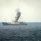 Russian spy ship catches fire, issues warning: "Please hear me"