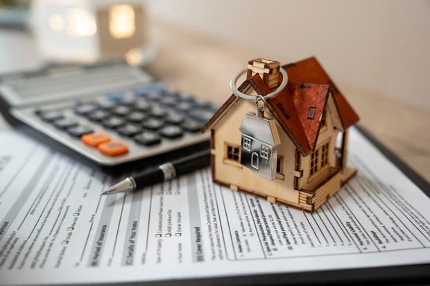 Money, pile coin with saving book and paper home,concept 