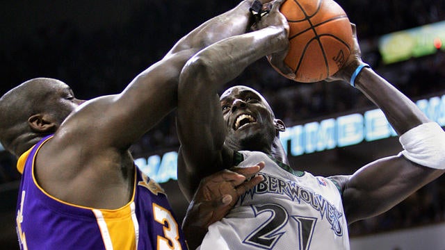 Lakers Shaquille O'Neal blocks the shot of Timberwolves Kevin Garnett in Game 5 of the Western Confe 