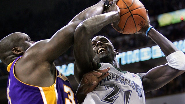 Lakers Shaquille O'Neal blocks the shot of Timberwolves Kevin Garnett in Game 5 of the Western Confe