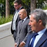 Walt Nauta, middle, leaves the federal Courthouse in Fort Pierce, Florida, on Aug. 10, 2023, with his attorney Stanley Woodward. Mar-a-Lago property manager Carlos De Oliveira is in the foreground. 
