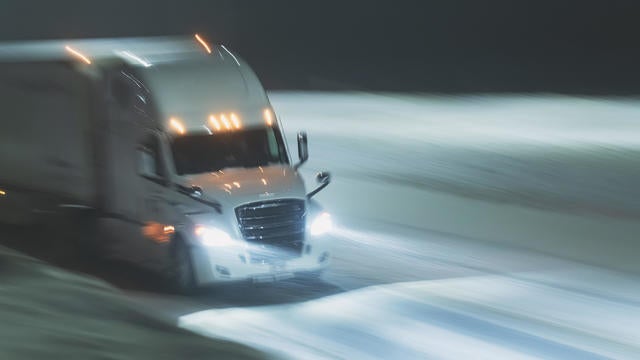 Semi Truck on Highway in Winter 