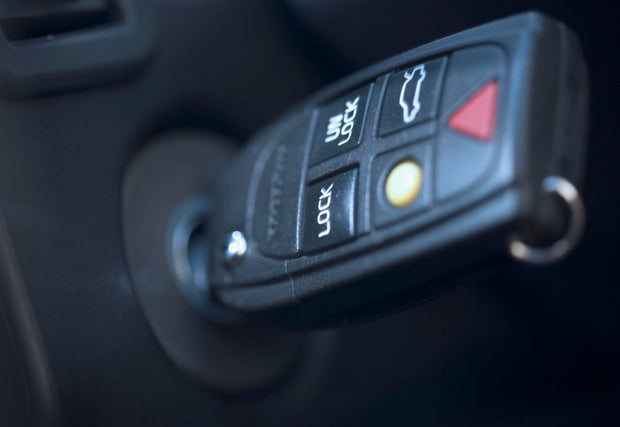 Closeup of key in car ignition 