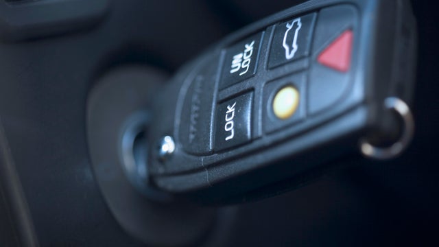 Closeup of key in car ignition 