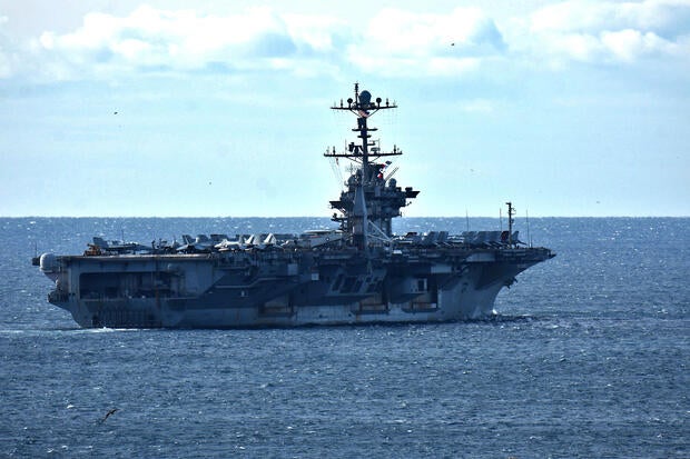 The aircraft carrier USS Harry S. Truman leaves the French Mediterranean port of Marseille, Dec. 3, 2024. 