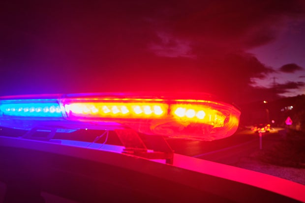 police car flashing lights in the night selective focus 