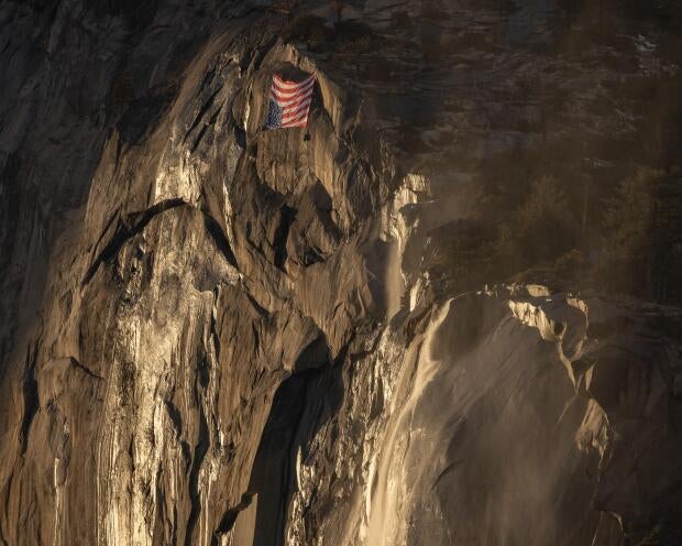 Upside-down U.S flag hung at Yosemite National Park by workers protesting job cuts