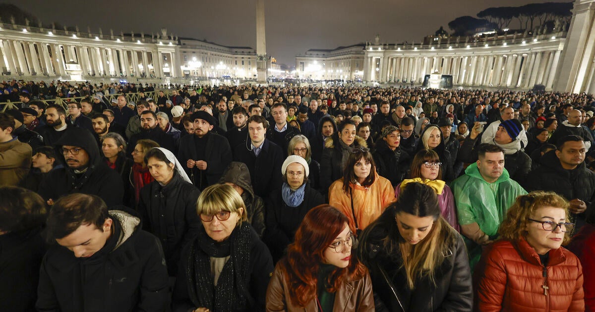 Thousands pray for ailing Pope Francis in chilly, rainy St. Peter's Square