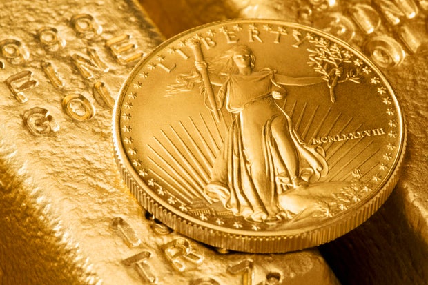 Gold bars and gold coin 