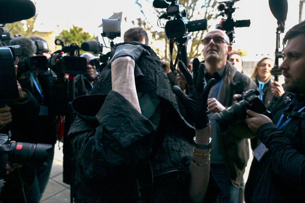 The ex-wife of retired surgeon Joel Le Scouarnec, Marie-France Le Scouarnec, arrives for the trial of her former husband, who is charged with sexually assaulting or raping 299 young patients, at the Criminal Court in Vannes, western France