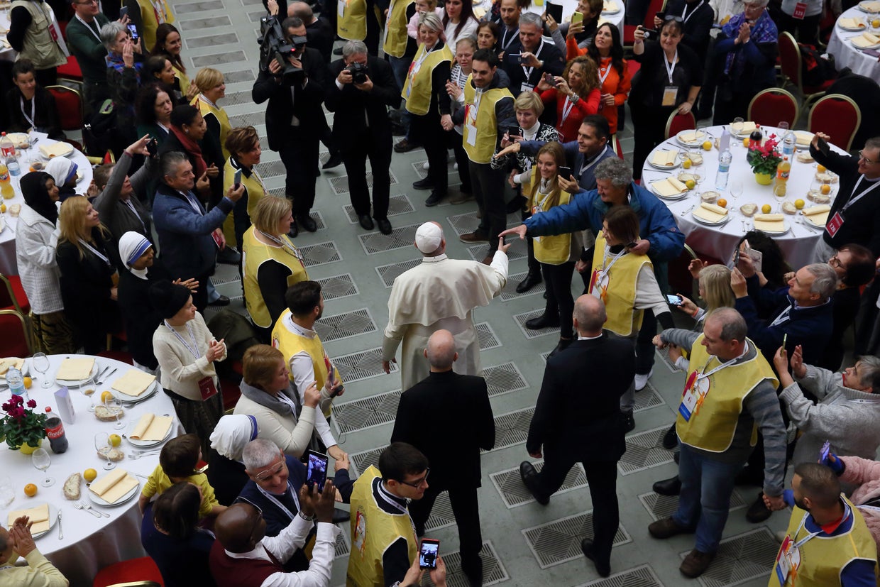 Pope Francis with the poor in the Vatican 