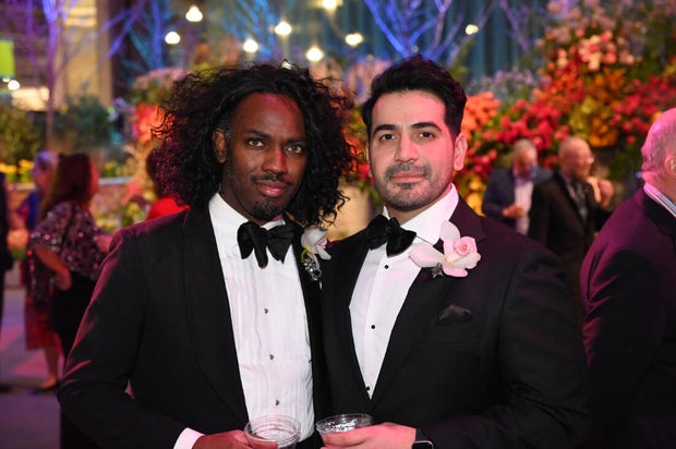 People pose for a photo at the Philadelphia Flower Show Preview Party