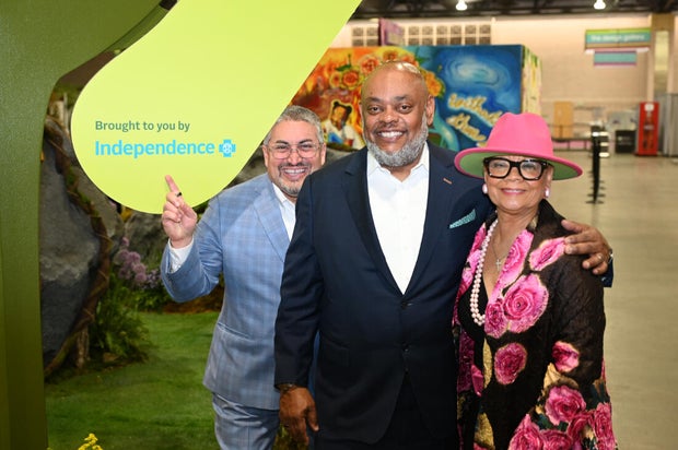 People pose for a photo at the Philadelphia Flower Show Preview Party