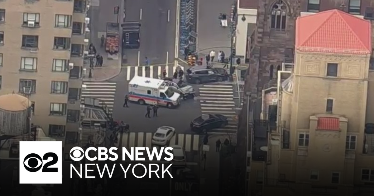 Car slams into utility pole in Midtown Manhattan - CBS New York
