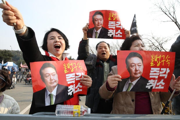 Protesters Gather As Courts Decide President Yoon's Fate 