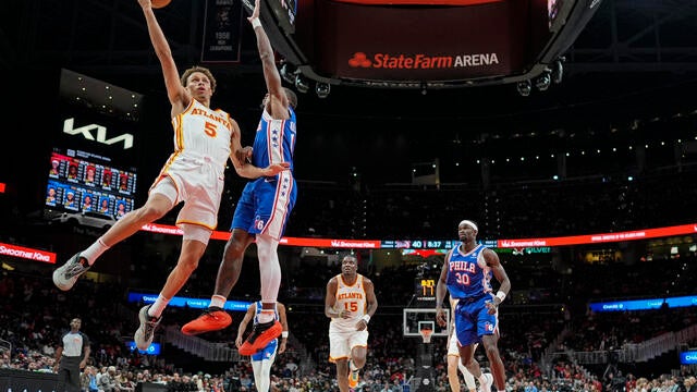 Atlanta Hawks guard Dyson Daniels (5) heads to the basket against the Philadelphia 76ers during the first half of an NBA basketball game in Atlanta 