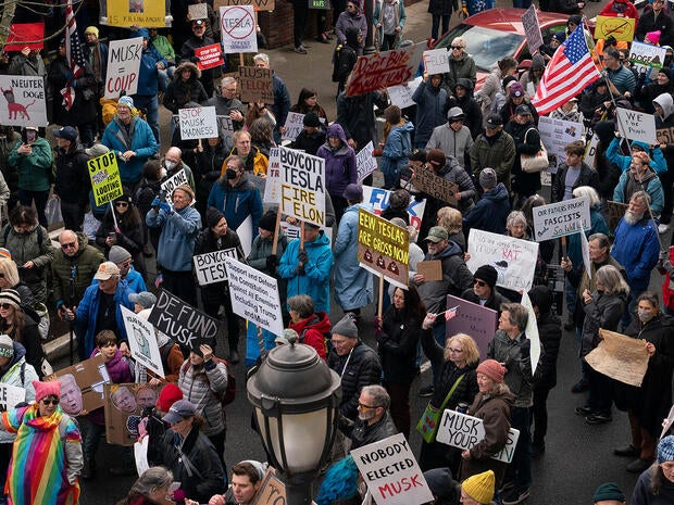 Protests Against Elon Musk At Tesla Showrooms 