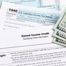 Earned income tax credit form. Tax credit, deduction and tax return concept. 
