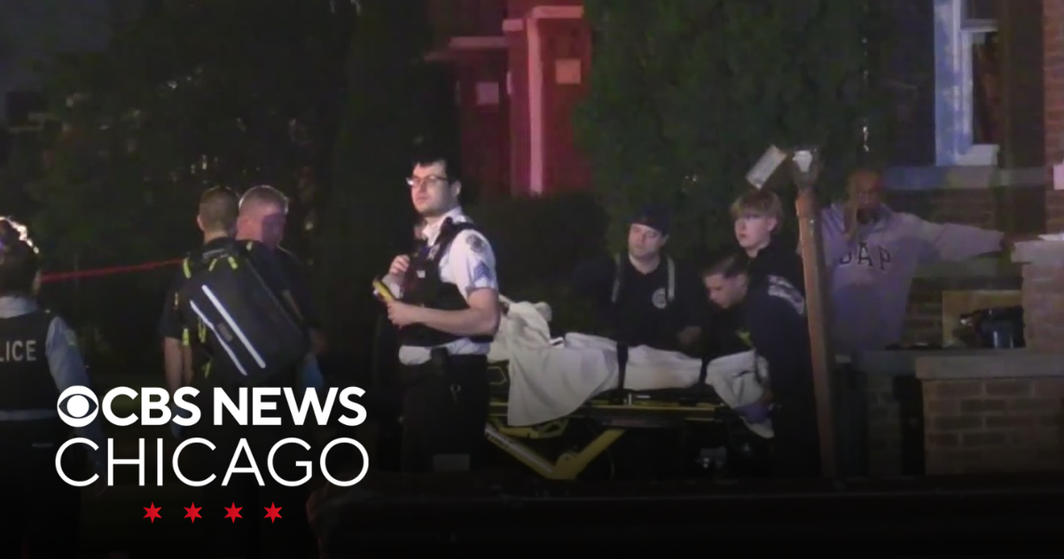 Man shot while sitting on porch on West Side - CBS Chicago